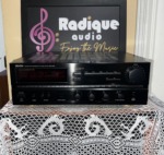 Denon DRA-835R stereo receiver, front panel with tuner display, tone controls and large volume knob