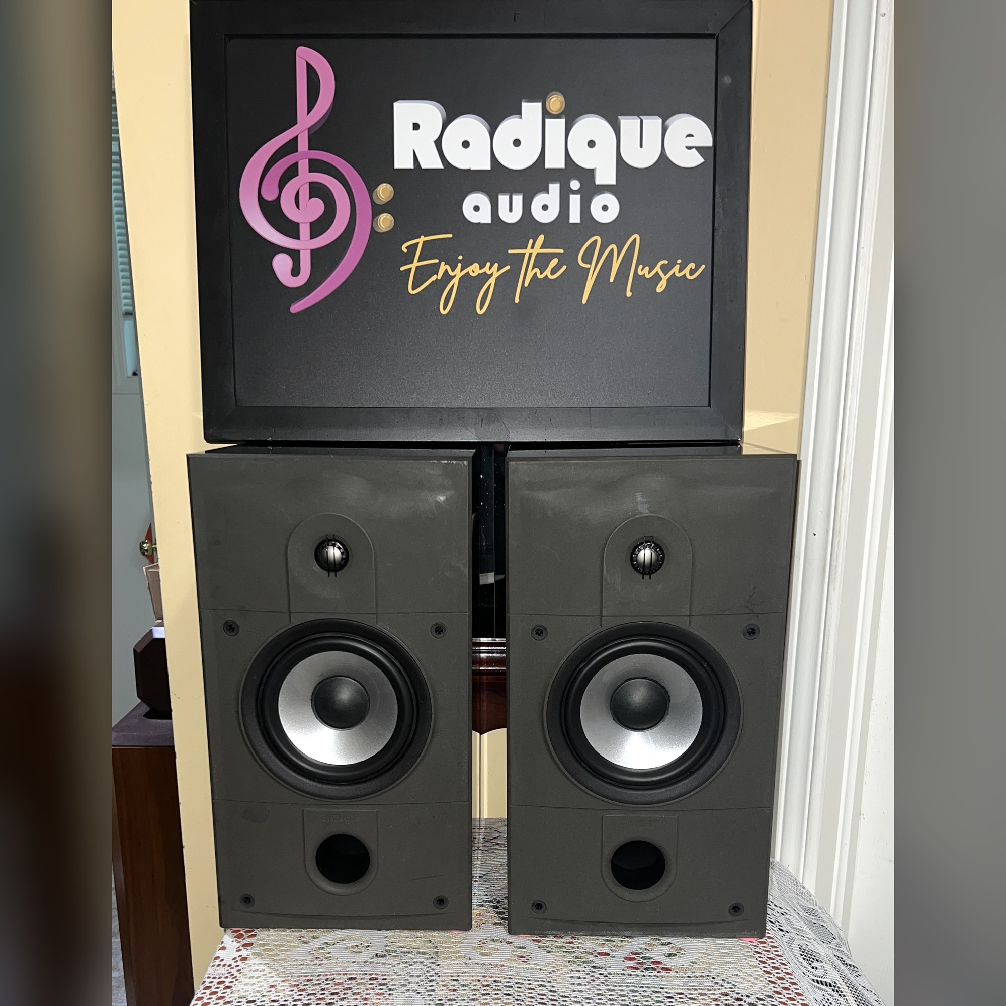 Energy-Connoisseur-C-2-Bookshelf-Speakers-High-Gloss-Black-Front-Thumb-Card Energy Connoisseur C-2 bookshelf speakers in high gloss black with grilles off, showing the tweeter, silver-cone woofer and front bass port