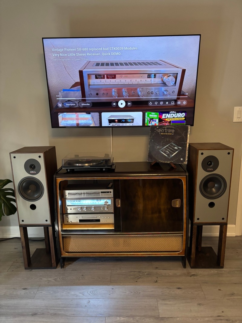 Erick’s Pioneer SX-680 and Energy ESM2 speakers with a vintage Grundig console, in Espanola, Ontario