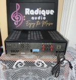 Rear panel of the Harman Kardon HK3500 showing phono, tape and CD RCA jacks, red and black speaker terminals and AC outlets