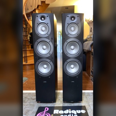 Infinity Beta 40 tower speakers — front view with grilles off, four drivers visible