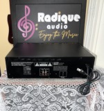 Rear panel of the JVC TD-W254BK showing the line in and line out RCA jacks, the model label and the attached power cord