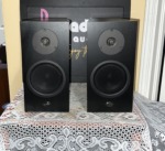 Linn Katan bookshelf speakers in black ash, a pair side by side showing the soft-dome tweeters, black mid/bass cones and Linn badges