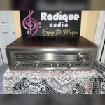 Luxman R-3030 receiver — front panel with the tuning dial and silver face
