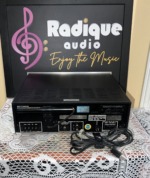 Rear panel of the Marantz 112 showing the antenna terminals, FM quadradial and line outputs, AC outlet and model label
