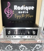 Marantz Model 1070 straight on: brushed silver faceplate with selector and volume knobs, slider tone and balance controls, mic and phones jacks