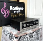Marantz Model 1070 integrated amplifier, brushed silver faceplate with selector and tape monitor knobs, slider tone controls and black case