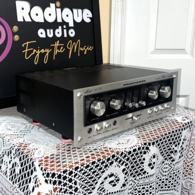 Marantz Model 1070 integrated amplifier, brushed silver faceplate with selector and tape monitor knobs, slider tone controls and black case