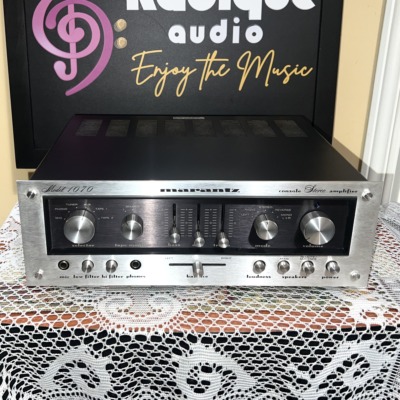 Marantz Model 1070 straight on: brushed silver faceplate with selector and volume knobs, slider tone and balance controls, mic and phones jacks