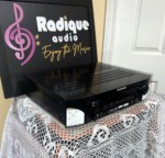 Marantz NR1510 AV receiver at an angle, showing the vented black top cover, side panel and front controls