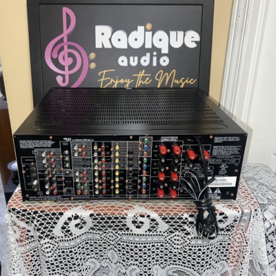 Rear panel of the Marantz SR7200 showing rows of RCA audio, video and component jacks, digital inputs and red speaker terminals