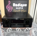Marantz SR7200 AV surround receiver in black, front panel with surround and volume knobs either side of a central display and input buttons