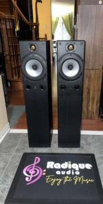 Pair of Monitor Audio Bronze 3 floorstanding speakers, grilles off, gold dome tweeters above silver mid-bass drivers and twin front ports