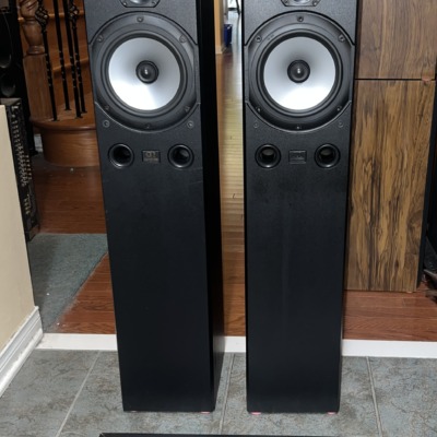 Pair of Monitor Audio Bronze 3 floorstanding speakers, grilles off, gold dome tweeters above silver mid-bass drivers and twin front ports