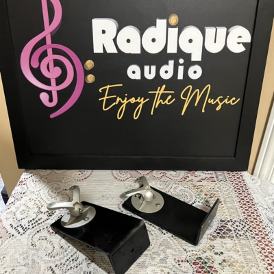 Monitor Audio Radius 90 wall brackets, a pair of black L-shaped arms each topped with a silver swivel ball joint and speaker mounting plate