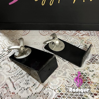 Monitor Audio Radius 90 wall brackets, a pair of black L-shaped arms each topped with a silver swivel ball joint and speaker mounting plate