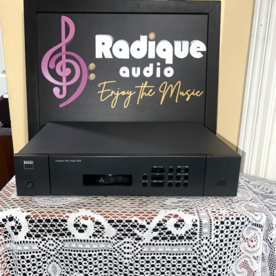 NAD 513 compact disc player in charcoal grey, three-disc display window, play, stop and open buttons and skip and scan keys