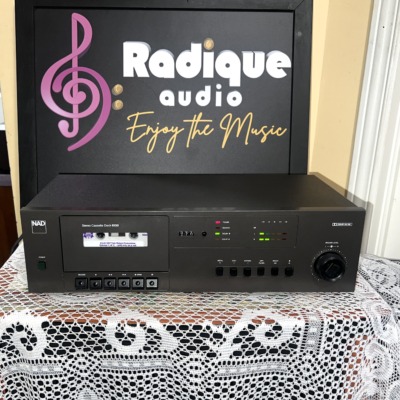 NAD 6130 stereo cassette deck in black, cassette window with tape loaded, tape counter, Dolby B/C lamps and transport keys