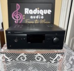 NAD T 757 AV surround sound receiver, front panel with display, volume knob and input buttons