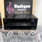 Onkyo TX-NR609 AV receiver in black, front panel with THX badge, display window, master volume knob and front USB, video and setup mic inputs
