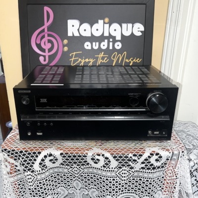 Onkyo TX-NR609 AV receiver in black, front panel with THX badge, display window, master volume knob and front USB, video and setup mic inputs