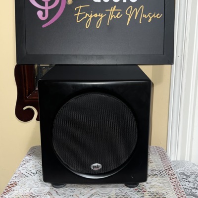 PSB SubSeries HD10 powered subwoofer front view, compact satin black cabinet with a black mesh grille over the front driver