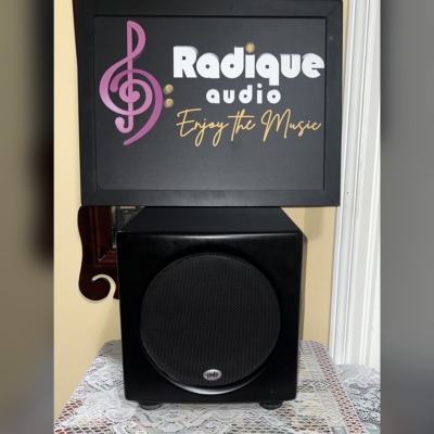 PSB SubSeries HD10 powered subwoofer front view, compact satin black cabinet with a black mesh grille over the front driver