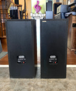 Rear of the Paisley Reference Two speakers, black panels with the Paisley Research badge, Made in Canada label and spring terminals