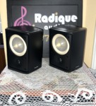 Paradigm Monitor ADP-190 v.6 surround speakers, grilles off, satin black cabinets with cream woofer cones above small tweeters