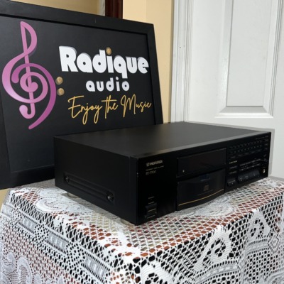 Pioneer PD-7700 CD player seen from a front angle, showing the black case and side panel