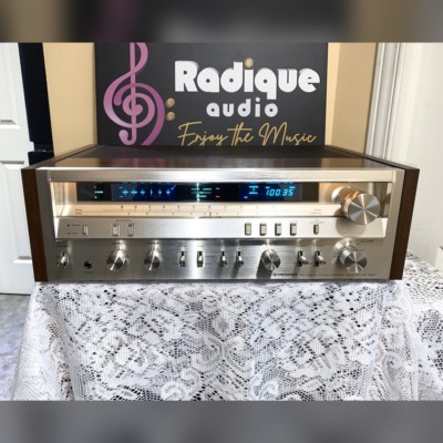 Pioneer SX-3800 vintage stereo receiver with original wood side panels — front view