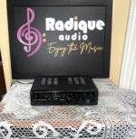 Realistic STA-20 AM/FM stereo receiver, compact black unit with a slide-rule FM/AM dial, tone, balance and volume knobs