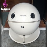 SoundSphere 2212-1 omnidirectional speaker, white sphere with the soundsphere name badge, two tweeters and a 22 decal, resting on a white dish