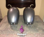Rear of the silver Tannoy Arena satellites, with a pair of chrome binding posts at the foot of each cabinet