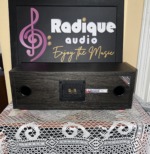 Rear of the Tannoy Mercury FC Custom center speaker showing two bass ports, gold binding posts and the Mercury FC Custom label