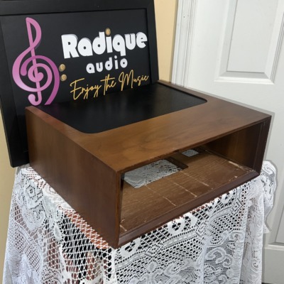 Vintage Marantz WC-22 wood cabinet seen from the front left, walnut-tone sides and top around the black perforated metal vent